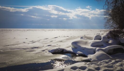 Frozen Lake Simcoe, Ontario, Canada on a sunny day.