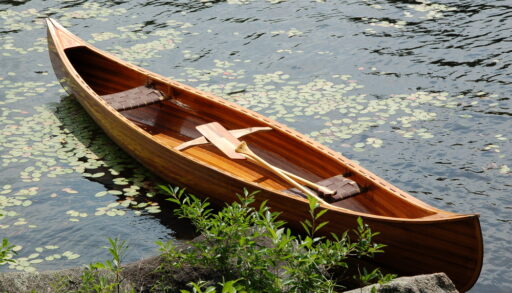 Cedar strip canoe in a lake