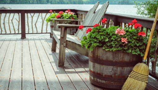 Wooden deck at Lake cabin with Adirondack chairs