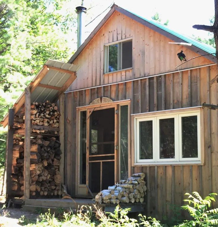 Woodshed beside cabin
