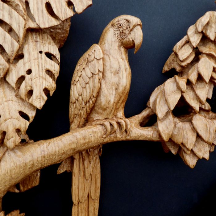 A parrot carved out of wood