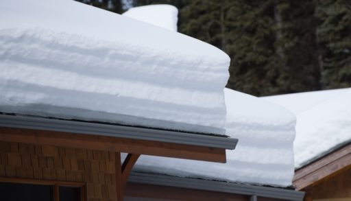 Rooftops covered in a thick blanket of snow