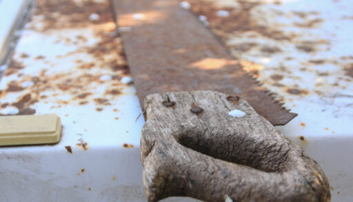 Close-up of a rusty saw