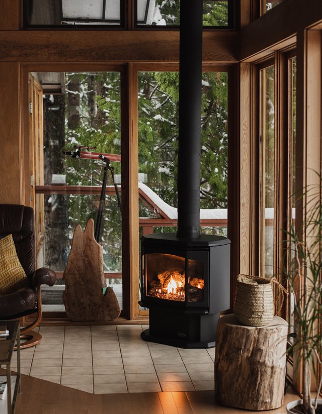wood fireplace inside cottage