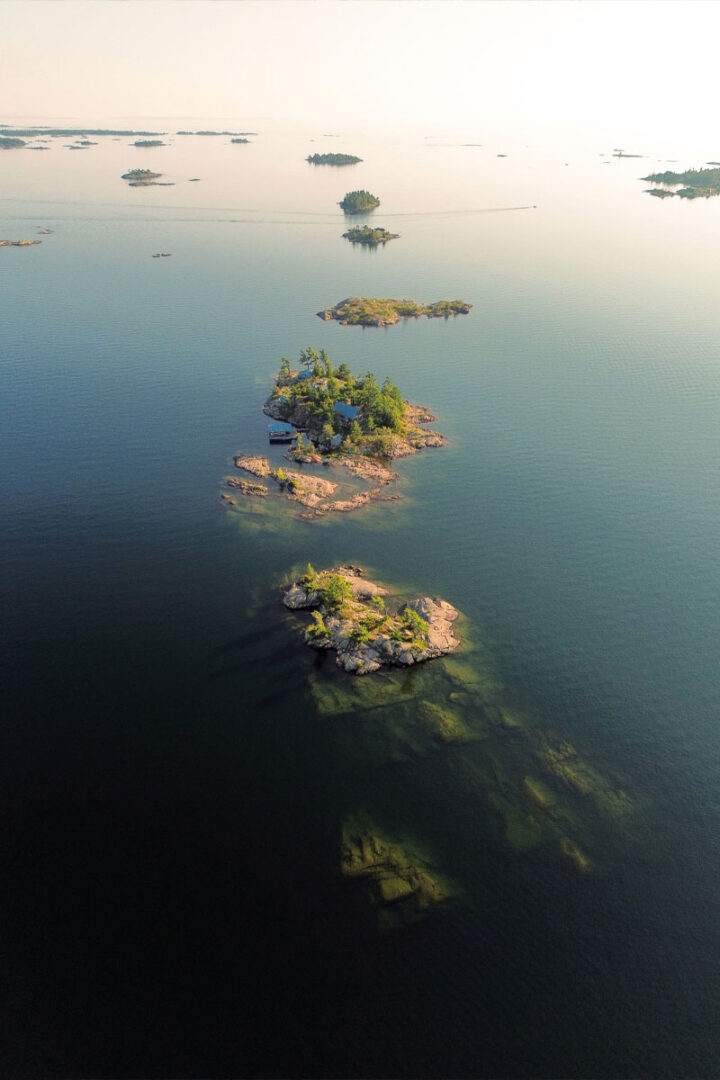 Drone shot of the islands of Sans Souci, Ont., from above at sunset