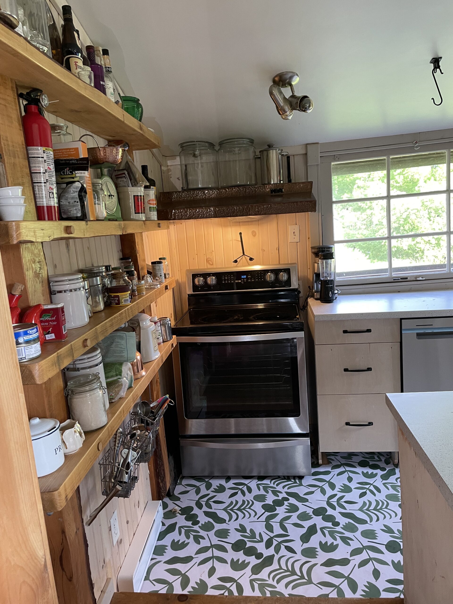 a kitchen with a patterned floor